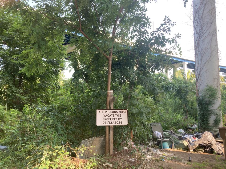 Signage placed around Old Tent City ordering clearing