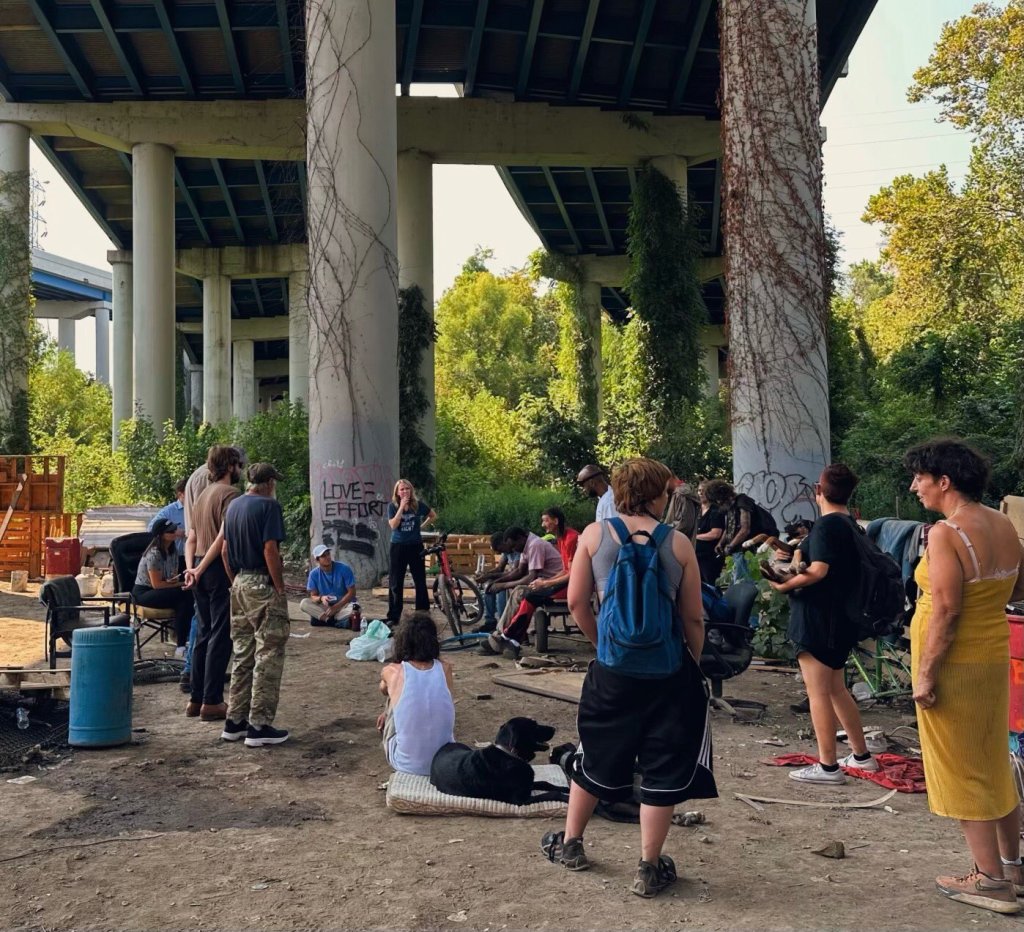 OTN Co-Founder and Executive Director, Lindsey Krinks, speaking to residents